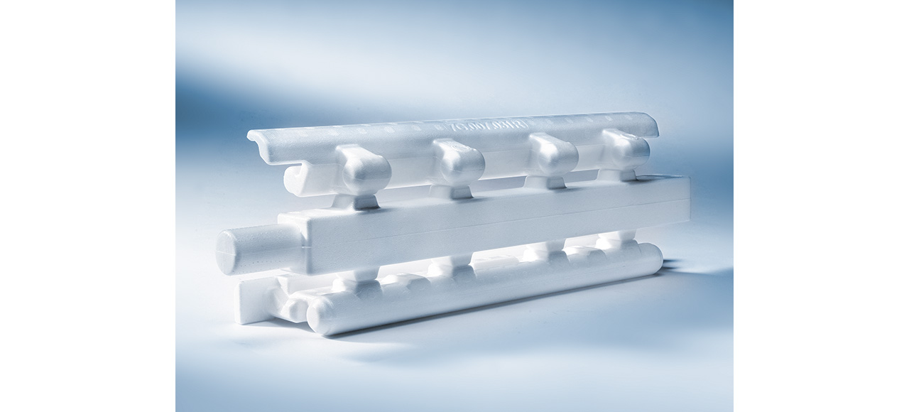 Ein weißes technisches Formteil als Gießtraube für Lost-Foam-Verfahren
